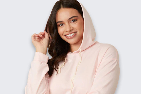 Woman in pink hoodie width=