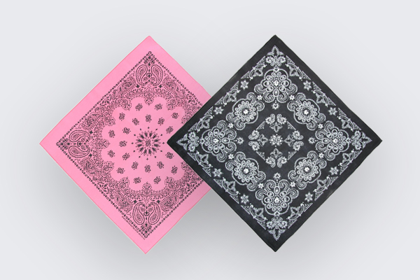 One pink and one black bandana displayed next to and overlapping each other