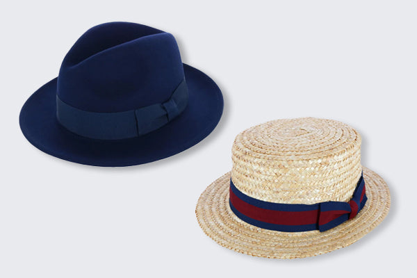 A blue fedora and straw boat hat