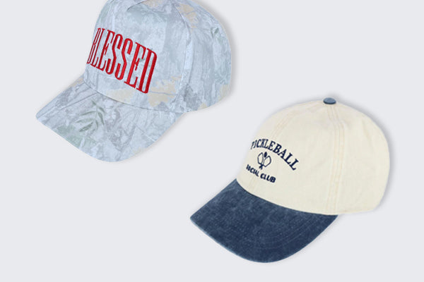 Two baseball caps