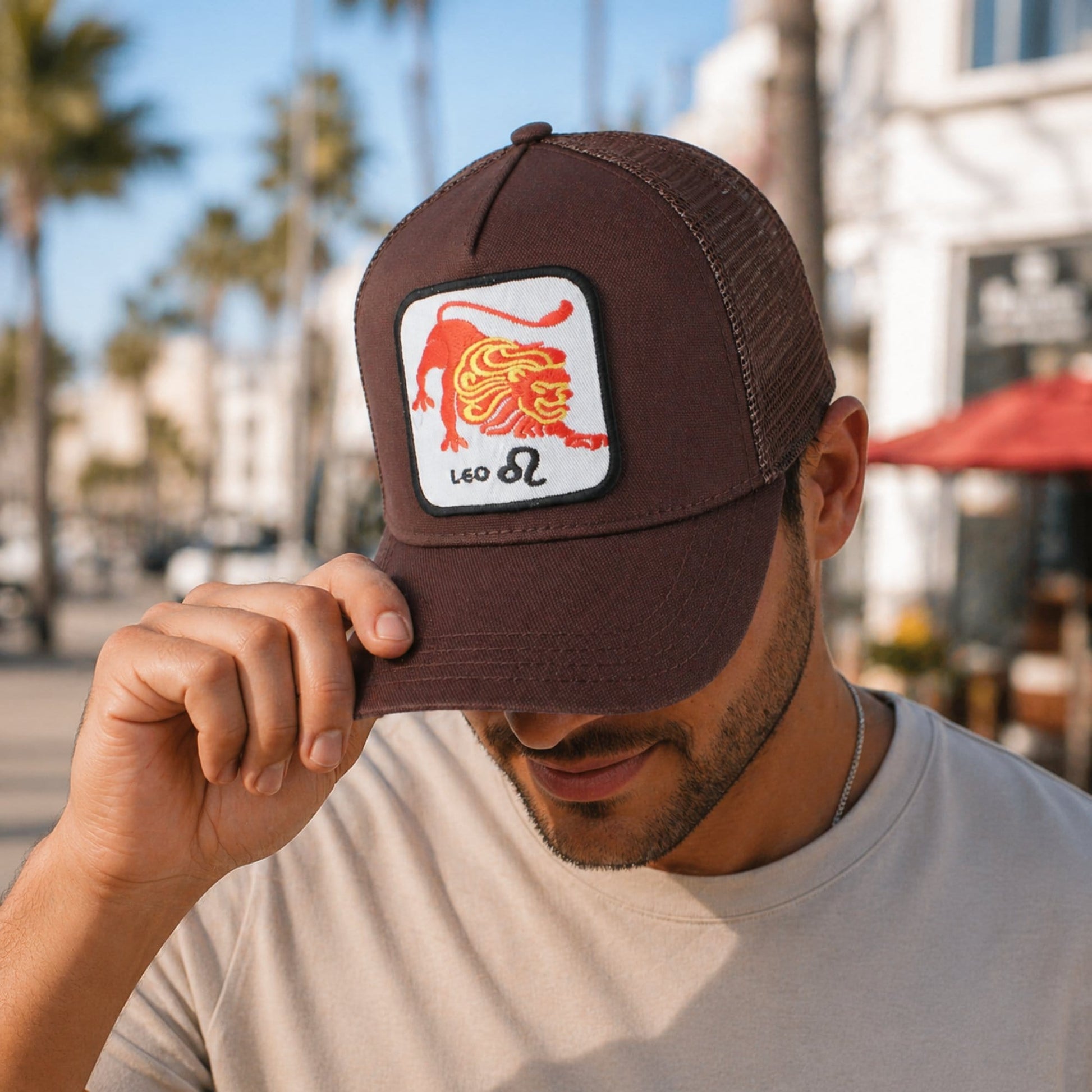 CTM® Unisex Zodiac Sign Astrology Patch Trucker Hat - Leo