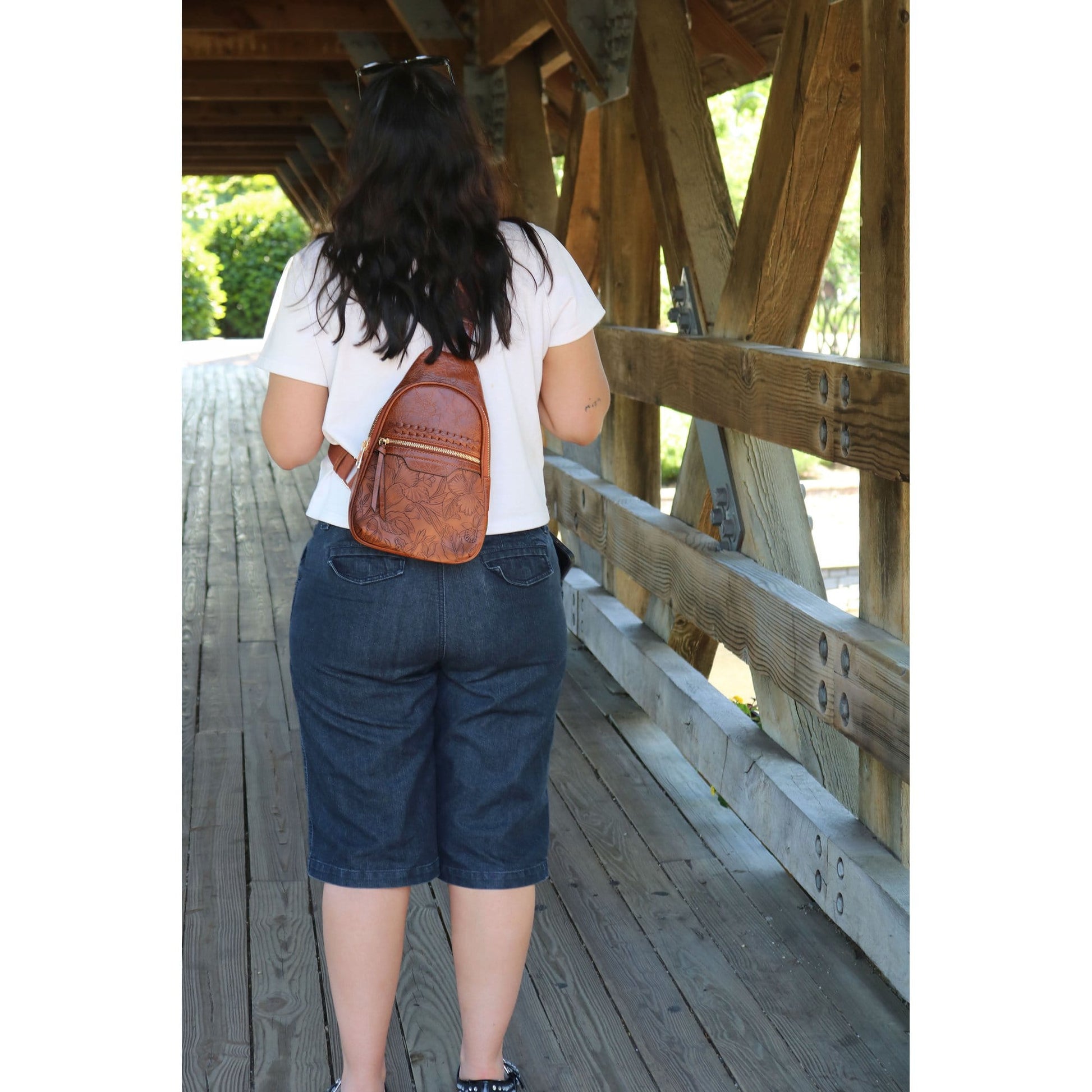 CTM® Women's Western Tooled Sling Crossbody Pack - Brown